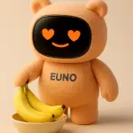 robot euno orange qui attrape des bananes dans un panier